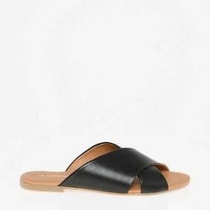 Black leather slide sandals